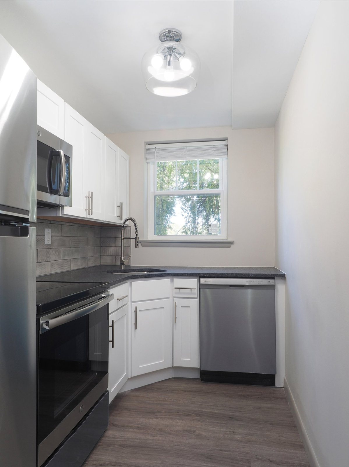 Renovated kitchen at Enclave and Parc West